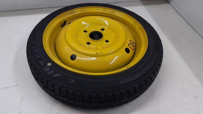 Space-saver spare wheel from a Nissan Pixo (D31S) 1.0 12V 2010