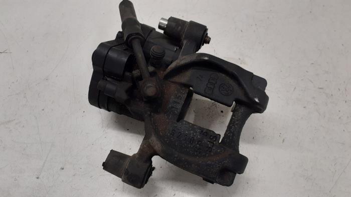 Rear brake calliper, right from a Volkswagen Golf VII (AUA) 1.4 TSI 16V 2014