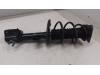 Front shock absorber rod, right from a Renault Clio IV (5R) 0.9 Energy TCE 90 12V 2019