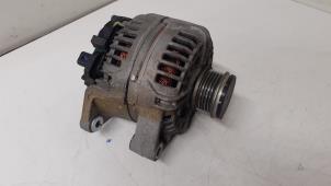Dynamo från en Opel Corsa D 1.4 16V Twinport 2010