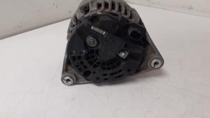 Dynamo från en Opel Corsa D 1.4 16V Twinport 2010