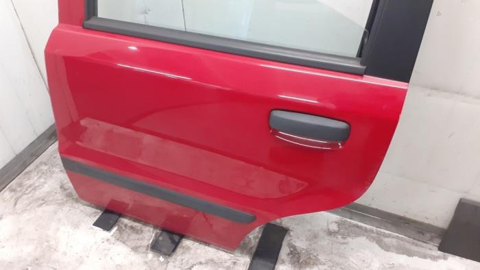 Rear door 4-door, left from a Fiat Panda (169) 1.2, Classic 2012