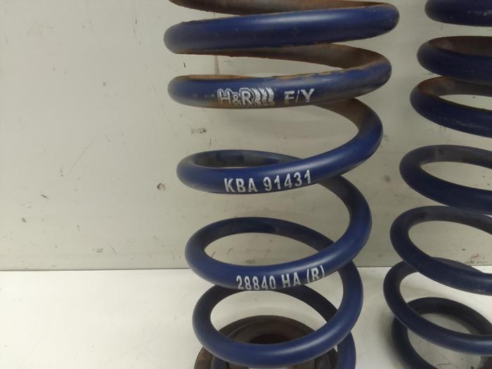 Rear coil spring from a Volkswagen Golf VII (AUA) 2.0 GTI 16V Performance Package 2013