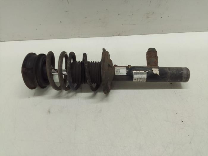 Front shock absorber rod, left from a Volkswagen Golf VII (AUA) 2.0 GTI 16V Performance Package 2013