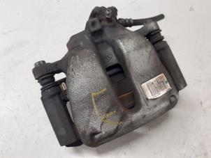 Used Front brake calliper, left Opel Corsa F (UB/UH/UP) 1.2 Turbo 12V 100 Price € 90,00 Margin scheme offered by Autodemontage van de Laar