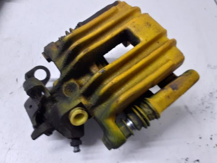 Rear brake calliper, left from a Volkswagen Polo V (6R) 1.2 TSI 2014