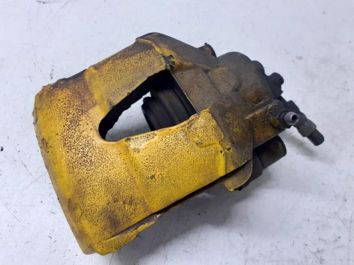 Front brake calliper, left from a Volkswagen Polo V (6R) 1.2 TSI 2014