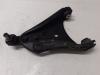Front wishbone, left from a Renault Twingo II (CN), 2007 / 2014 1.2 16V, Hatchback, 2-dr, Petrol, 1.149cc, 55kW (75pk), FWD, D4F764; D4FE7, 2011-10 / 2014-09, CN01; CND1; CNF1; CNJ1; CNJ6; CNL1; CNL6 2014