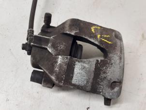 Used Front brake calliper, left Volkswagen Polo VI (AW1) 1.0 MPI 12V Price € 50,00 Margin scheme offered by Autodemontage van de Laar