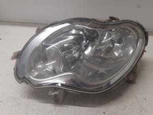 Used Headlight, left Smart Fortwo Coupé (450.3) 0.8 CDI Price € 35,00 Margin scheme offered by Autodemontage van de Laar