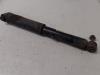 Rear shock absorber, left from a Renault Grand Scénic III (JZ) 1.5 dCi 110 2013
