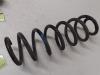Rear coil spring from a Renault Grand Scénic III (JZ) 1.5 dCi 110 2013