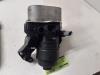 Oil filter housing from a Volkswagen Polo VI (AW1) 1.6 TDI 16V 95 2018