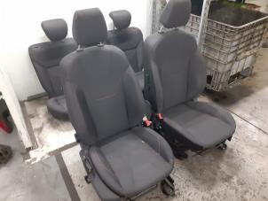Used Set of upholstery (complete) Ford Focus 3 Wagon 1.5 EcoBoost 16V 150 Price on request offered by Autodemontage van de Laar