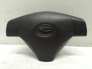 Used Left airbag (steering wheel) Daihatsu Cuore (L251/271/276) 1.0 12V DVVT Price € 75,00 Margin scheme offered by Autodemontage van de Laar