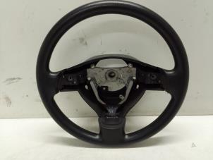 Used Steering wheel Daihatsu Cuore (L251/271/276) 1.0 12V DVVT Price € 50,00 Margin scheme offered by Autodemontage van de Laar
