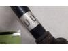 Front drive shaft, left from a Opel Corsa D 1.4 16V Twinport 2010