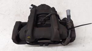 Used Front brake calliper, left BMW 1 serie (F20) 116i 1.5 12V Price € 50,00 Margin scheme offered by Autodemontage van de Laar