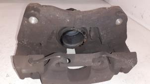 Used Front brake calliper, left Volkswagen Transporter T5 2.0 TDI DRF Price on request offered by Autodemontage van de Laar