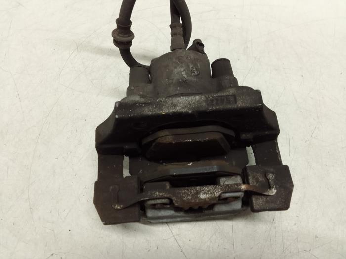 Rear brake calliper, left from a BMW X5 (F15) xDrive 40e PHEV 2.0 2015