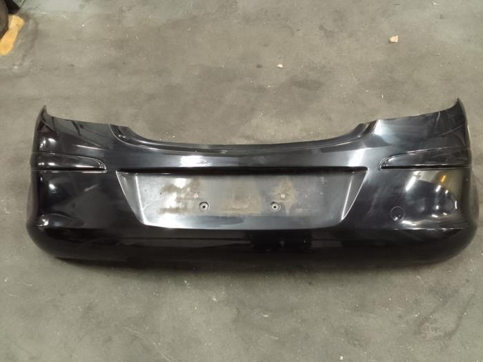 Rear bumper Opel Corsa D 1.2 16V ecoFLEX Bi-Fuel Z20R - 13179893