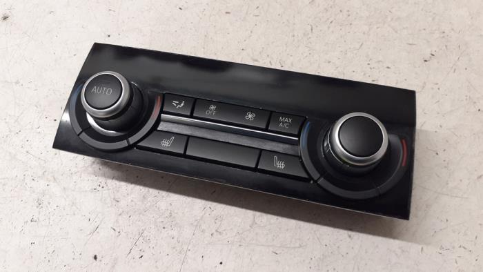 Heater control panel from a BMW 5 serie Touring (F11) 535d xDrive 24V 2014