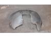 Wheel arch liner from a Opel Corsa D, 2006 / 2014 1.2 16V, Hatchback, Petrol, 1.229cc, 59kW (80pk), FWD, Z12XEP; EURO4, 2006-07 / 2014-08 2008