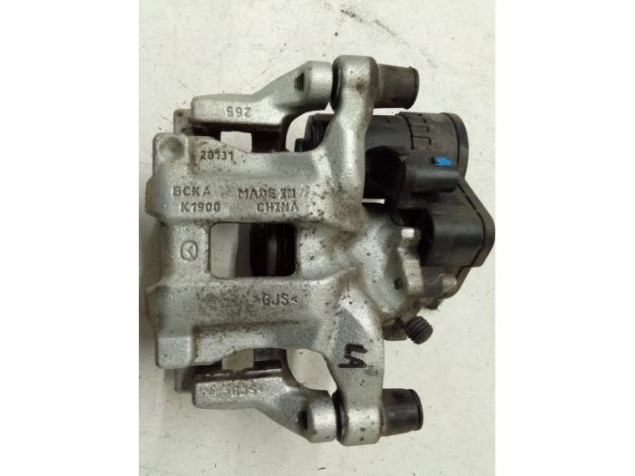 Rear brake calliper, left from a Mazda CX-30 (DM) 2.0 e-SkyActiv X 186 16V 2021