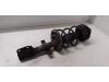 Front shock absorber rod, left from a Renault Modus/Grand Modus (JP) 1.2 16V TCE 100 2008
