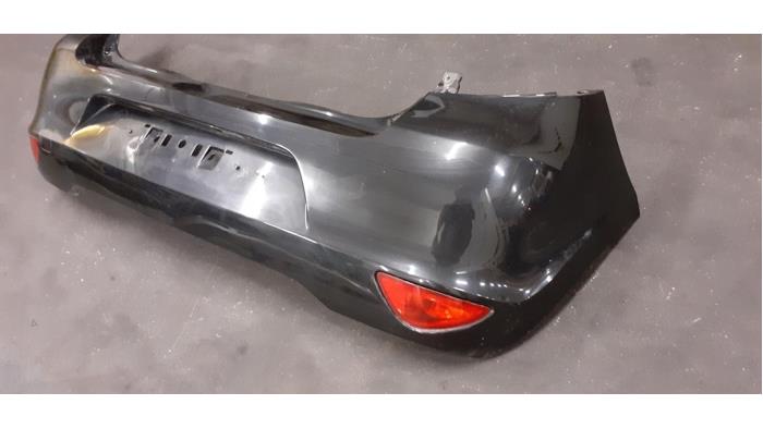 Rear bumper from a Renault Clio III (BR/CR) 1.2 16V 75 2010