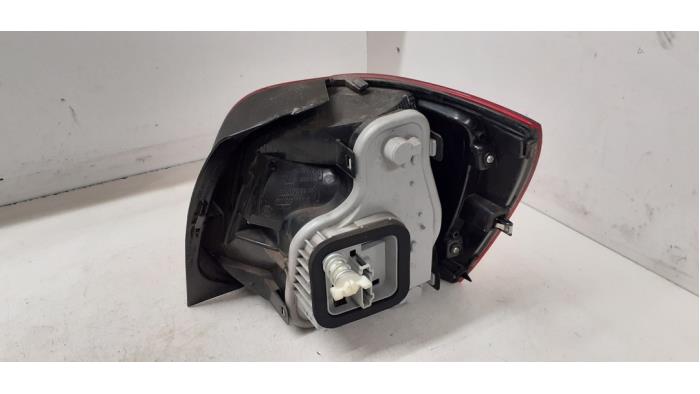Taillight, left from a Volkswagen Polo V (6R) 1.2 TSI 2013