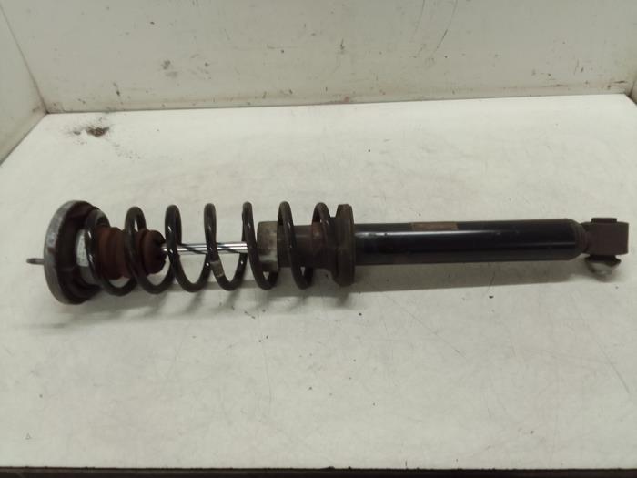 Rear shock absorber rod, left from a BMW 5 serie (F10) 525d 16V 2013