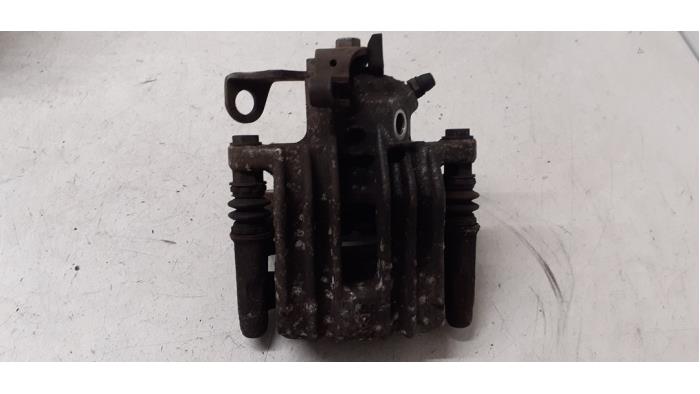 Rear brake calliper, right from a Skoda Fabia III (NJ3) 1.0 TSI 12V 2019