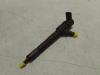 Injector (diesel) from a Opel Corsa D  2010