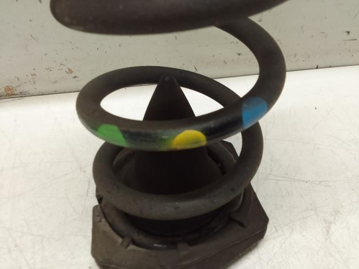 Rear coil spring from a Renault Grand Scénic IV (RFAR) 1.3 TCE 160 16V 2019
