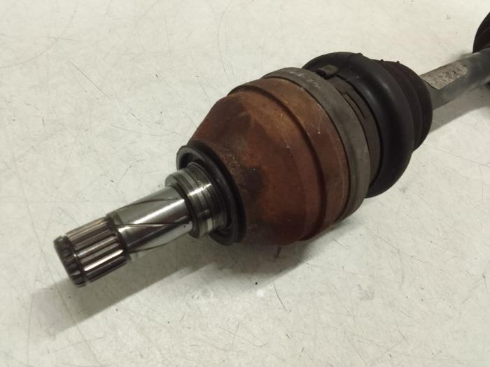 Front drive shaft, left from a Opel Zafira (M75) 1.8 16V Ecotec 2006