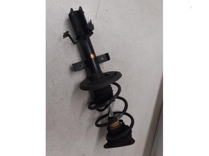 Front shock absorber rod, left from a Renault Clio IV Estate/Grandtour (7R) 1.5 Energy dCi 90 FAP 2013