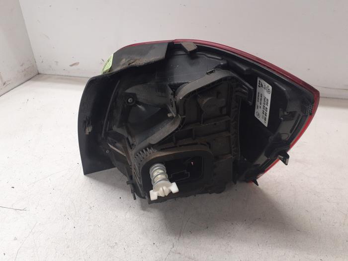Taillight, left from a Volkswagen Polo V (6R) 1.4 TDI DPF BlueMotion technology 2015