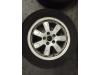Set of sports wheels + winter tyres from a Volkswagen Polo V (6R) 1.2 TDI 12V BlueMotion 2011