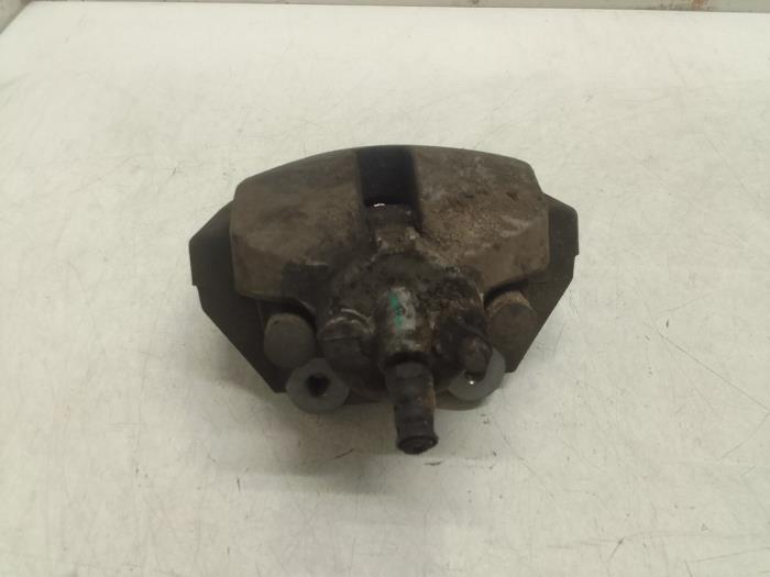 Rear brake calliper, left from a BMW X5 (F15) xDrive 50i 4.4 V8 32V 2013