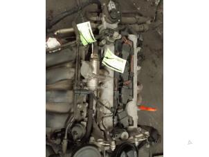 Engine from a Volkswagen Golf V (1K1) 1.6 FSI 16V 2006