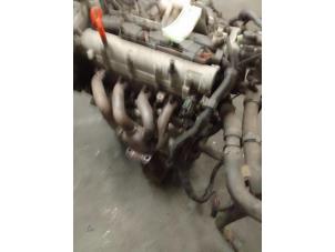 Engine from a Volkswagen Golf V (1K1) 1.6 FSI 16V 2006