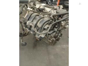 Engine from a Volkswagen Golf V (1K1) 1.6 FSI 16V 2006