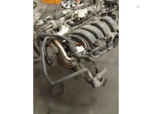 Engine from a Volkswagen Golf V (1K1) 1.6 FSI 16V 2006