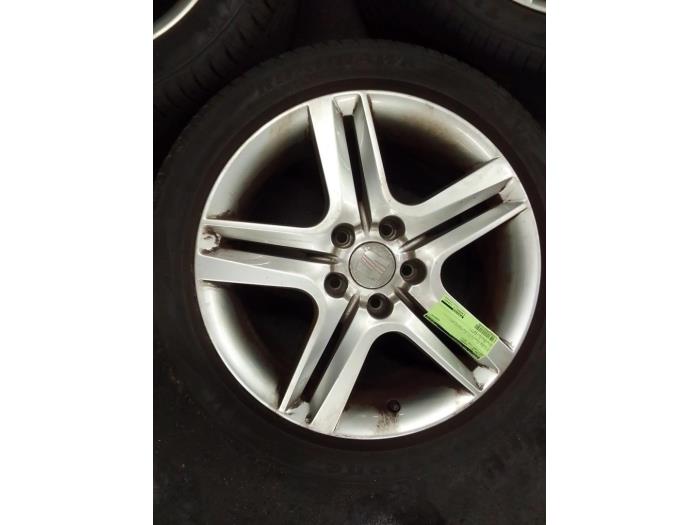 Sport rims set + tires from a Seat Leon (1P1) 1.2 TSI 2013