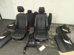 Used Set of upholstery (complete) BMW 1 serie (F20) 116d 1.5 12V TwinPower Price on request offered by Autodemontage van de Laar