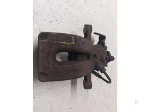 Used Rear brake calliper, left Renault Clio III (BR/CR) 1.2 16V TCe 100 Price on request offered by Autodemontage van de Laar