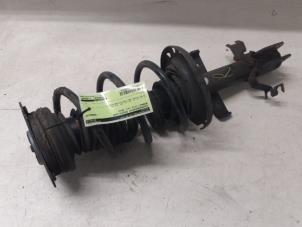 Used Front shock absorber rod, right Renault Clio III (BR/CR) 1.2 16V TCe 100 Price on request offered by Autodemontage van de Laar
