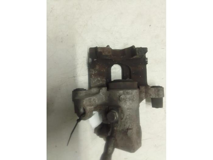 Rear brake calliper, left from a Ford Fiesta 7 1.0 EcoBoost 12V 100 2018