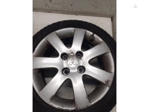 Used Wheel + winter tyre Mitsubishi Colt Price on request offered by Autodemontage van de Laar